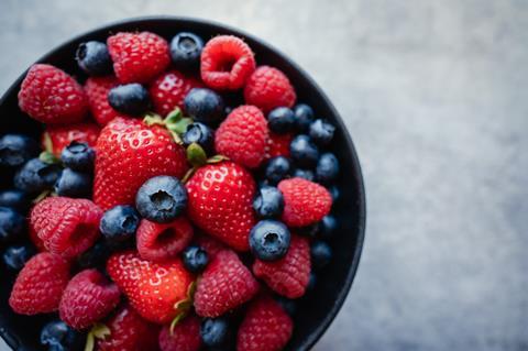 Mixed berries in a bowl Adobe