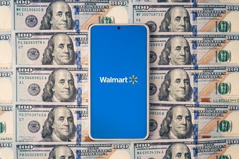 Walmart logo smartphone dollars MUST CREDIT diy13 Adobe Stock