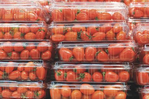 Tomatoes in unbranded clear plastic punnets