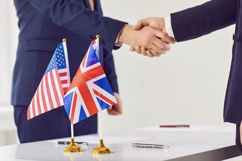 US UK agreement flags handshake