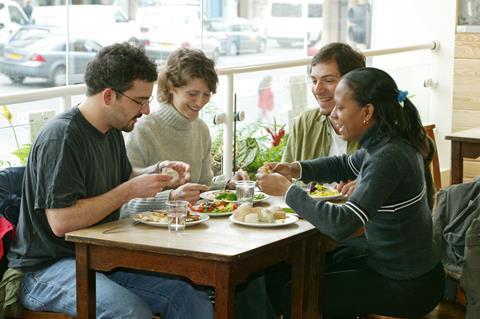 GEN people eating in a restaurant