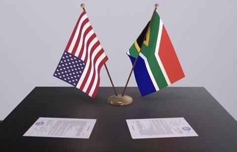 USA South Africa flags table agreement