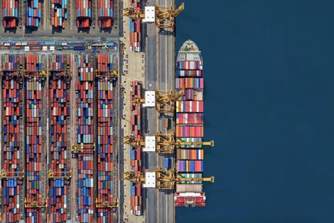 Top down view of generic container ship at port