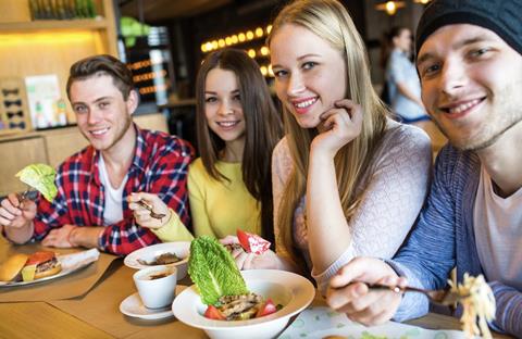 Gen Z eating in cafe