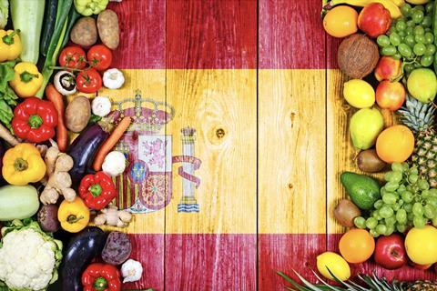 Mixed Spanish fruit and vegetables on flag
