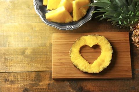Pineapple cut out heart chopping board Fyffes